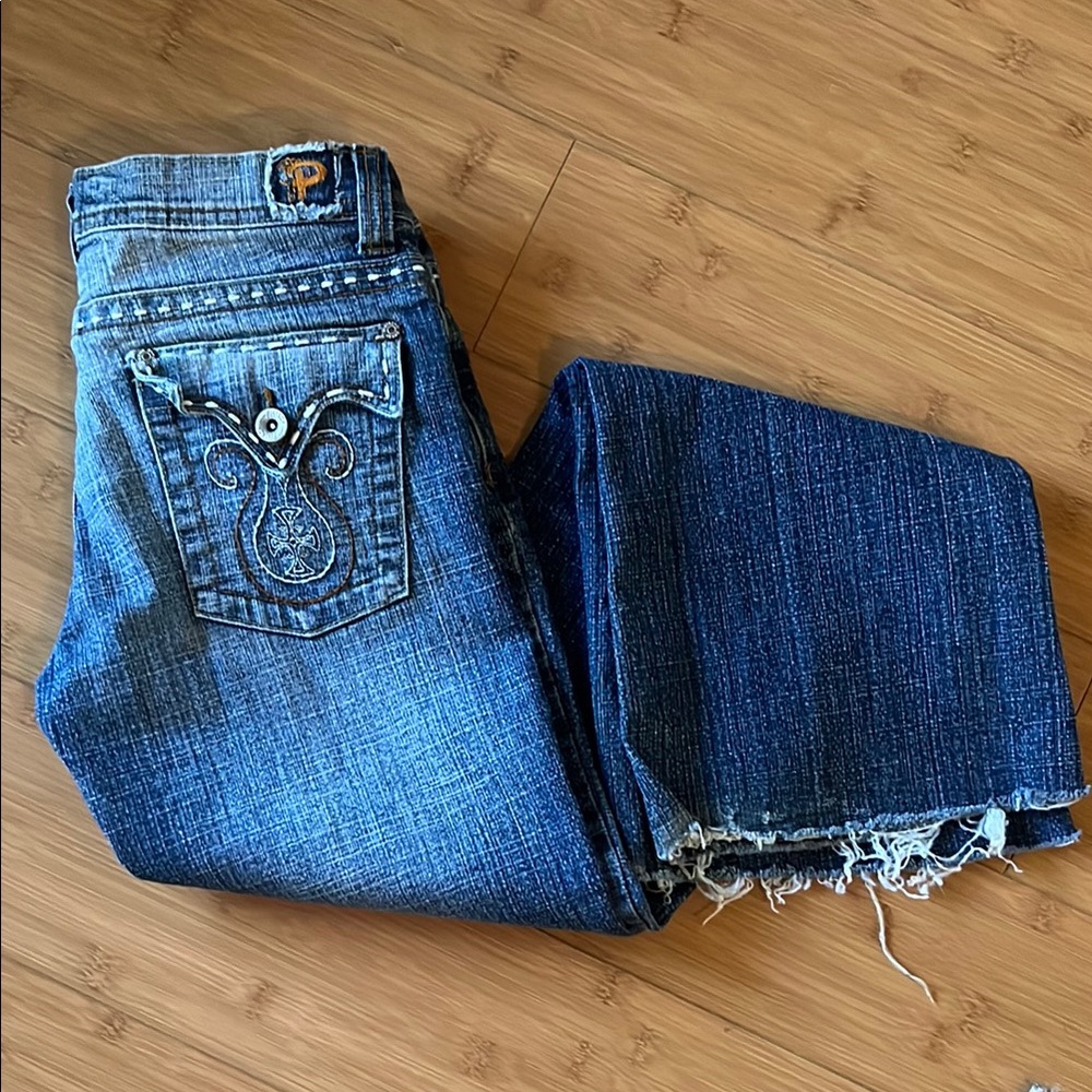 Blue Bootcut Jeans with Vintage Fading and Distressed Details